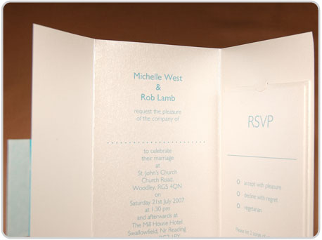 Fold and seal wedding invitation names with border detail sealing the